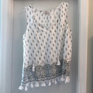 Loft, sleeveless tops with fringe.
